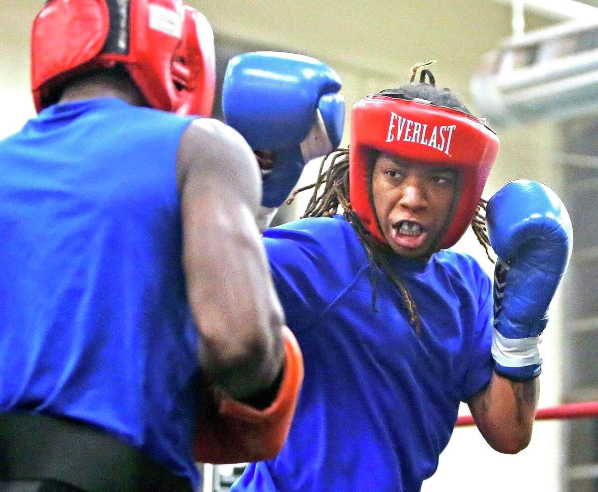 Ravven Brown who is a national champion and a member of team USA goes thru sparing with Marcus Toney in preparation for next week's Golden Glove boxing tournament at Lincoln Community Center on Monday, February 11, 2019.