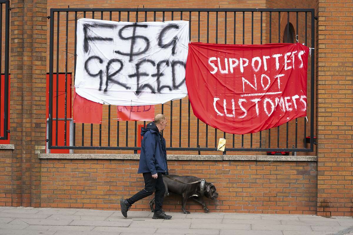 Banners are seen outside Liverpool's Anfield Stadium after the collapse of English involvement in the proposed European Super League,