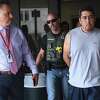 Joaquin Garcia is transported from the Beaumont Police Headquarters to jail after being interviewed by police in regards to the stabbing death of Norlan Moreno. Garcia was arrested in Victoria, Texas, Tuesday night. Photo made Thursday, April 22, 2021 Kim Brent/The Enterprise