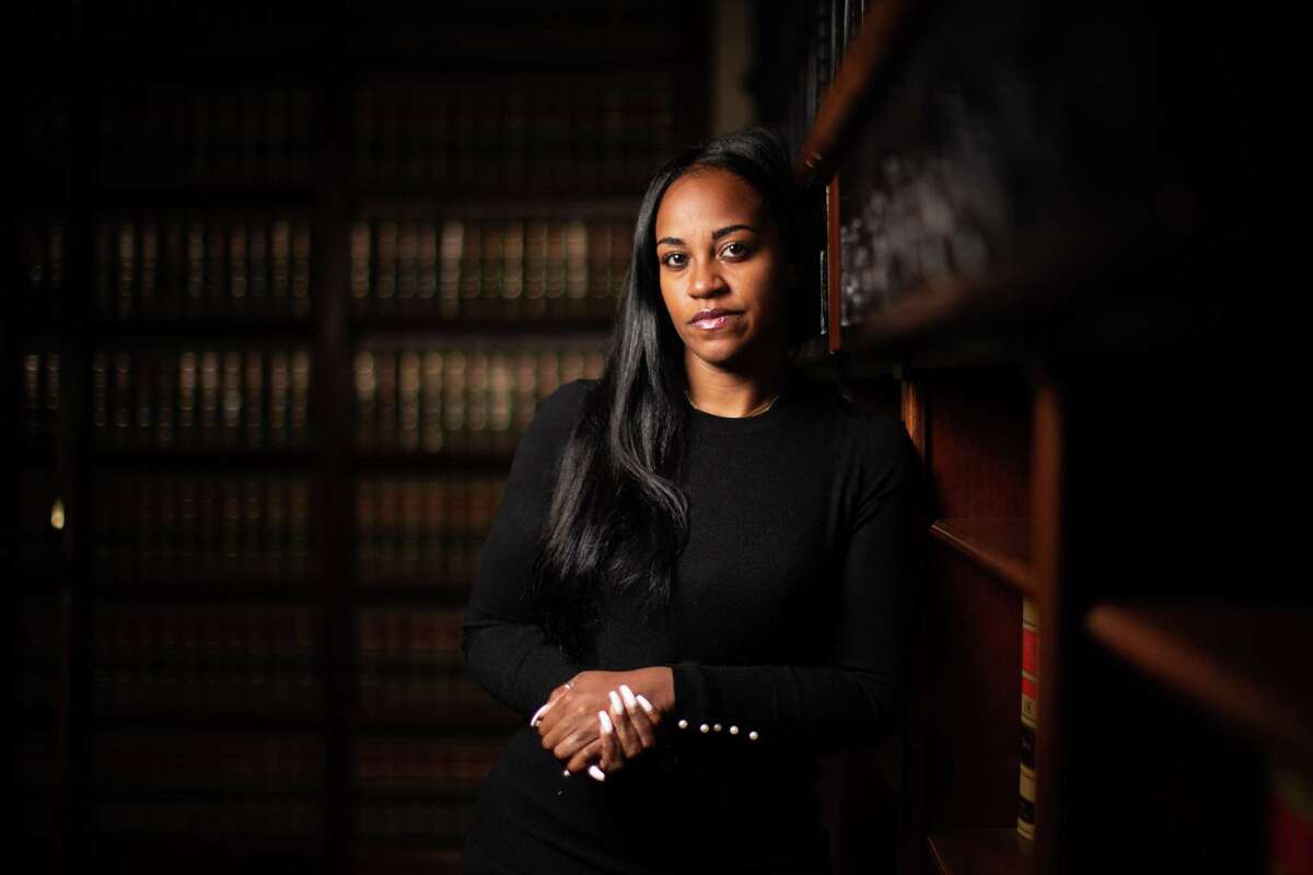 A portrait of Erica Davis at her lawyer’s office on Feb. 10, 2021 in Houston. "Even though this was a traumatic experience, it is my prayer that when others see me, they see courage," said Davis, who serves on Harris County’s board of education and on Precinct 1 Constable Alan Rosen’s staff, reported being assaulted at a Massage Heights branch on West Holcombe near the Texas Medical Center in 2019. Davis and her husband are suing the Massage Heights, franchise owner, Asif Hafiz and Wenjin Zhu, also known as James Jefferson, the therapist accused in the attack.