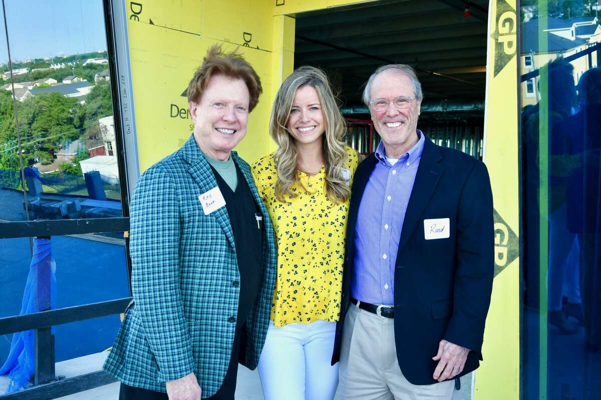 Dr. Mike Mann, Brandy Bellow Spinks, Randall Turner attend the topping out ceremony for Museo Medical Office Building, 5115 Fannin Street.