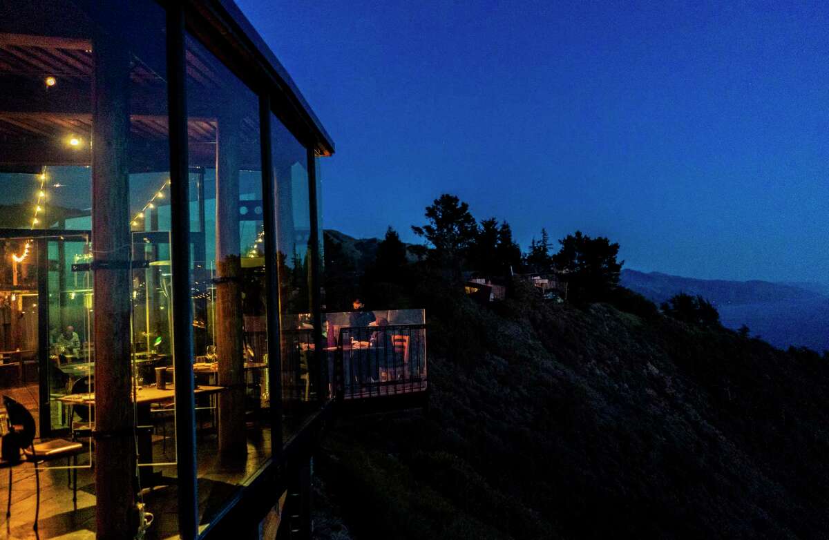 Guests dine outside on the deck at the Post Ranch Inn in Big Sur, California on March 1, 2021.