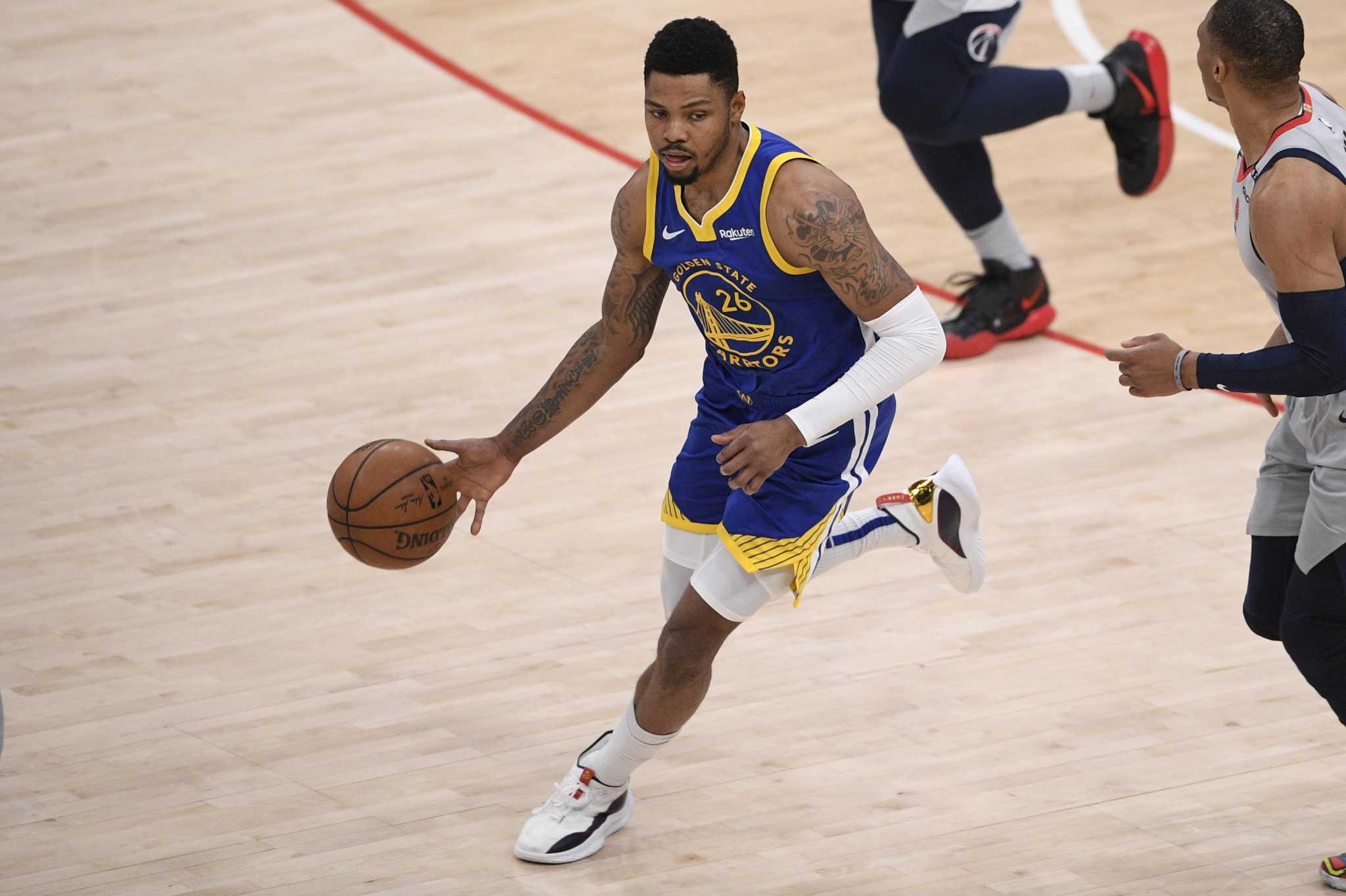 Kent Bazemore of the Golden State Warriors looks on during the