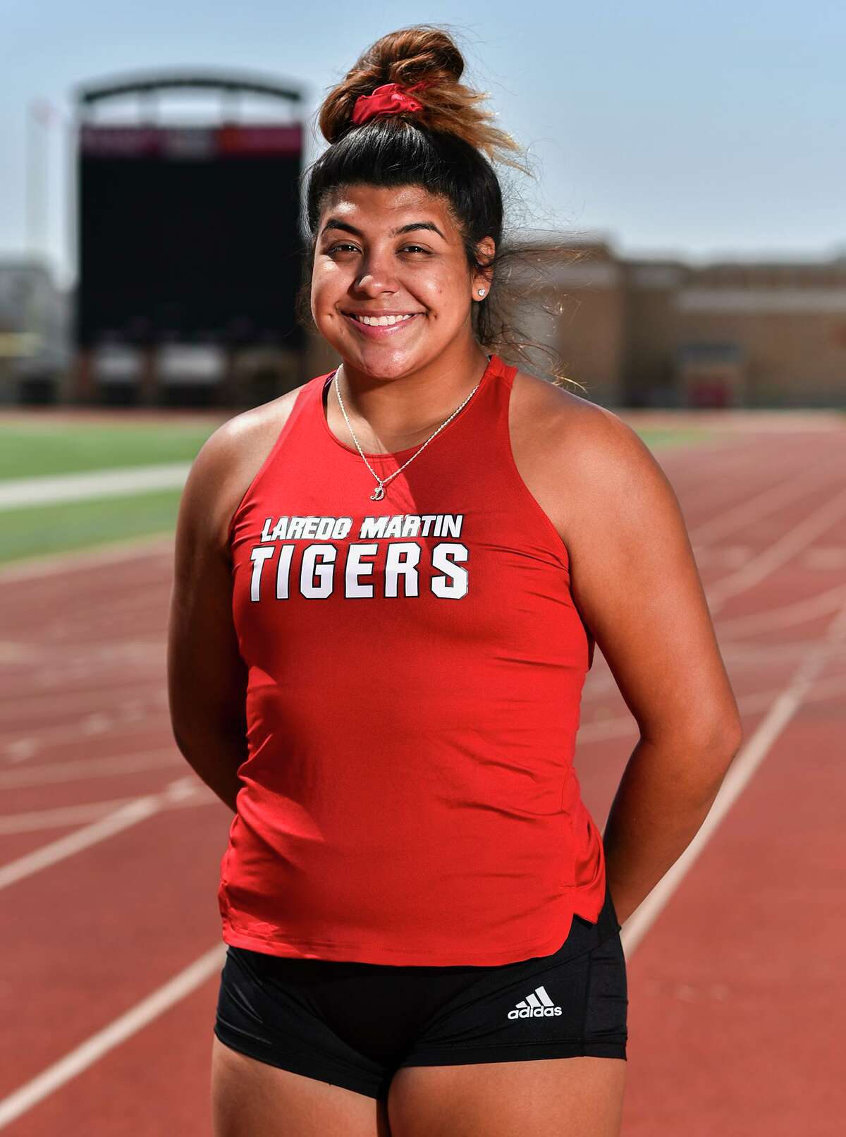 Martin’s Melanie Duron broke her city record in the shot put for the second straight competition to win a regional championship and advance to the state meet.