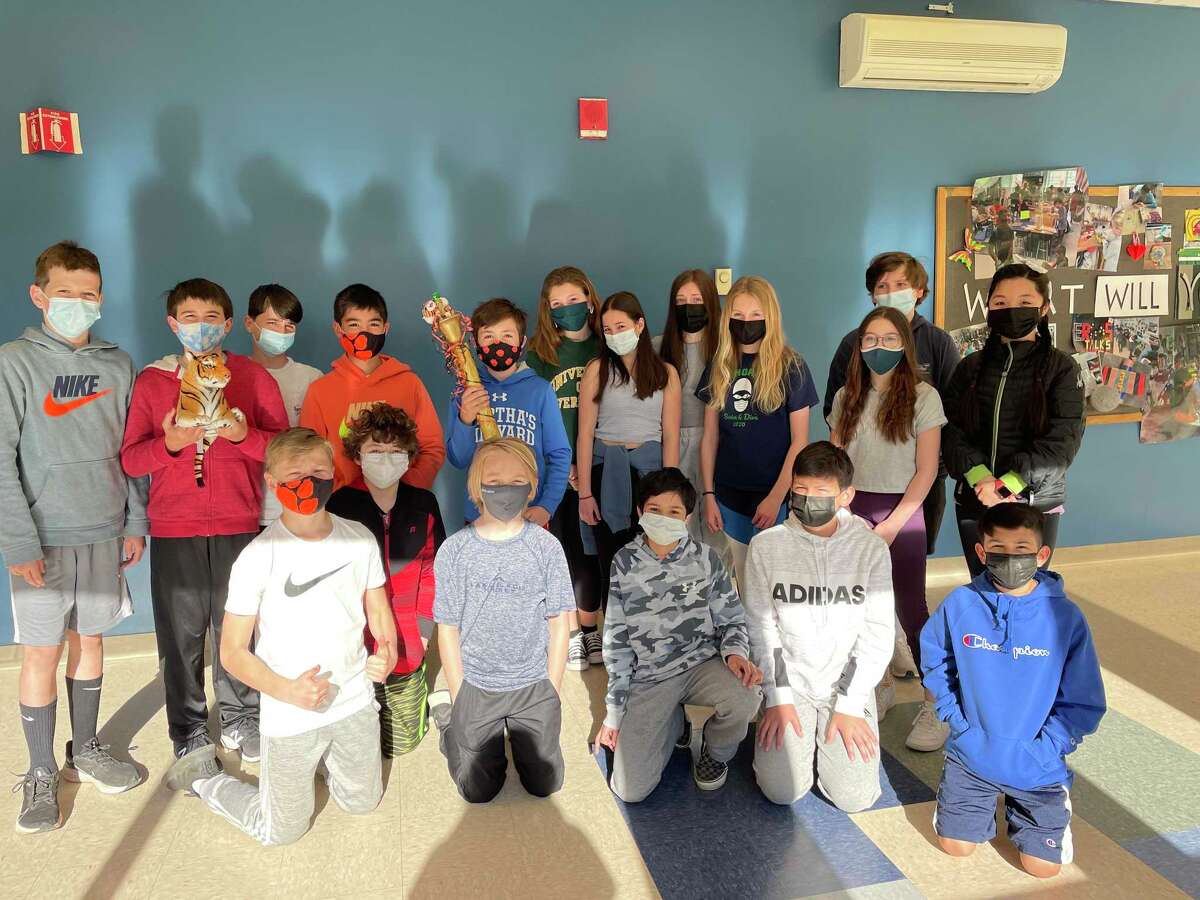 East Ridge Middle School sixth graders posed with the school's spirit stick, which they earned after being declared the overall winners of Spirit Week.