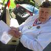 Bill Vornkahl, "Mr. Parade," a Korean War veteran who has organized the parades for almost 50 years, looks over the plans, at the Memorial Day parade on May 27, 2019, in Westport.