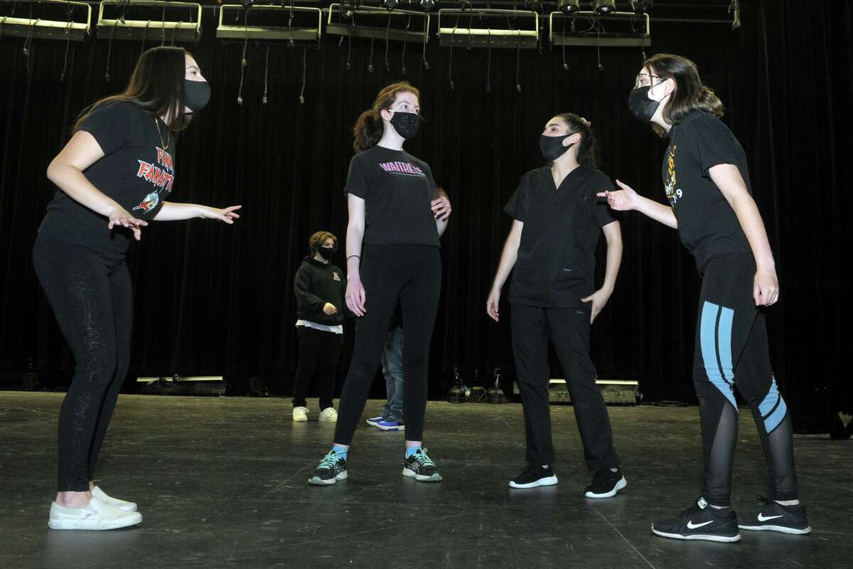 The Shelton High School drama club rehearse for their upcoming musical review in Shelton, Conn. April 22, 2021.