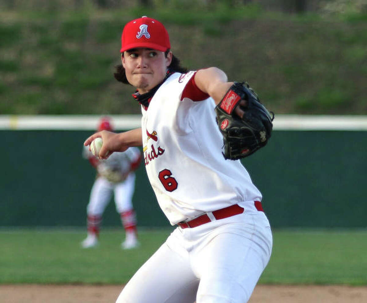 Alton's Jackson Brooks, shown pitching earlier in the season at Alton High, was back on the mound at home Friday and pitched into the seventh inning in the Redbirds' 2-1 victory over Belleville West in Godfrey.