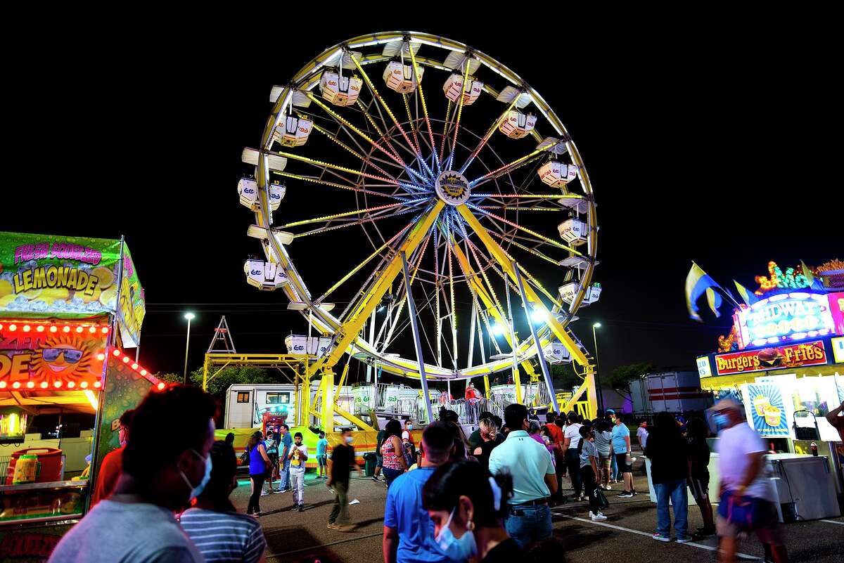 Laredoans head to the Sames Auto Arena parking lot, Friday, April 16, 2021, for the Spring Fling Carnival.