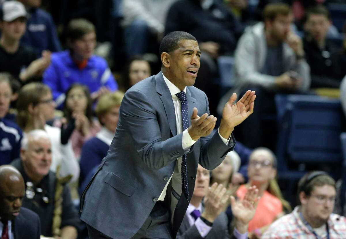 Former UConn head coach Kevin Ollie shouts from the bench during the first half of a game in 2016.