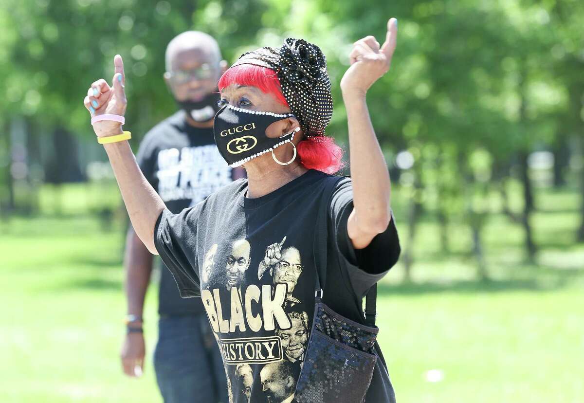 Barbara Myers shares her thoughts during a vigil for George Floyd sponsored by Houston's Black Lives Matter at McGregor Park in Houston on Saturday, April 24, 2021.