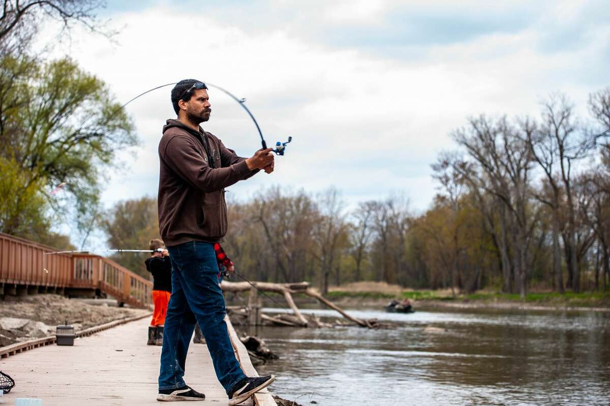 Coleman resident Chris Wilson flicks his line at the Freeland Walleye Festival on April 24, 2021.