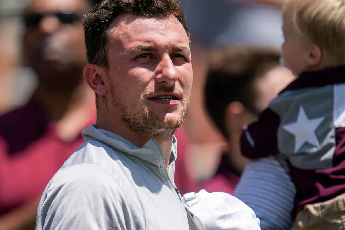Texas A&M alumnus Johnny Manziel stands for the national anthem ]before the start of the Texas A&M Maroon and White Spring game in College Station, Texas on Saturday, April 24, 2021. (Sam Craft)