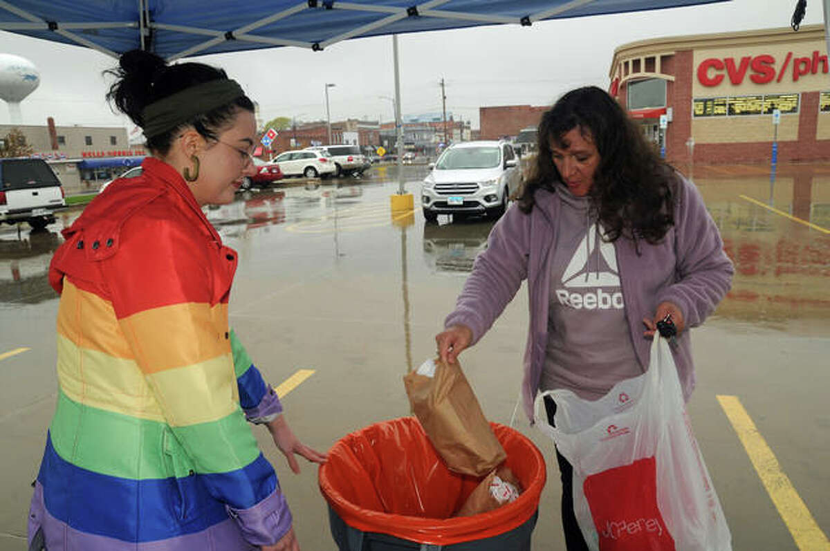Georgia Groppel, of Jerseyville, disposes of 20 years’ worth of unused medicines during the National Prescription Drug Take Back Day Saturday at CVS in Jerseyville.