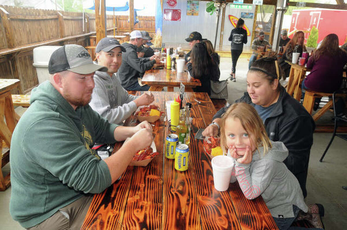 The Radake family, of Gillespie, enjoys the Crawfish Boil at the Prairie Inn.