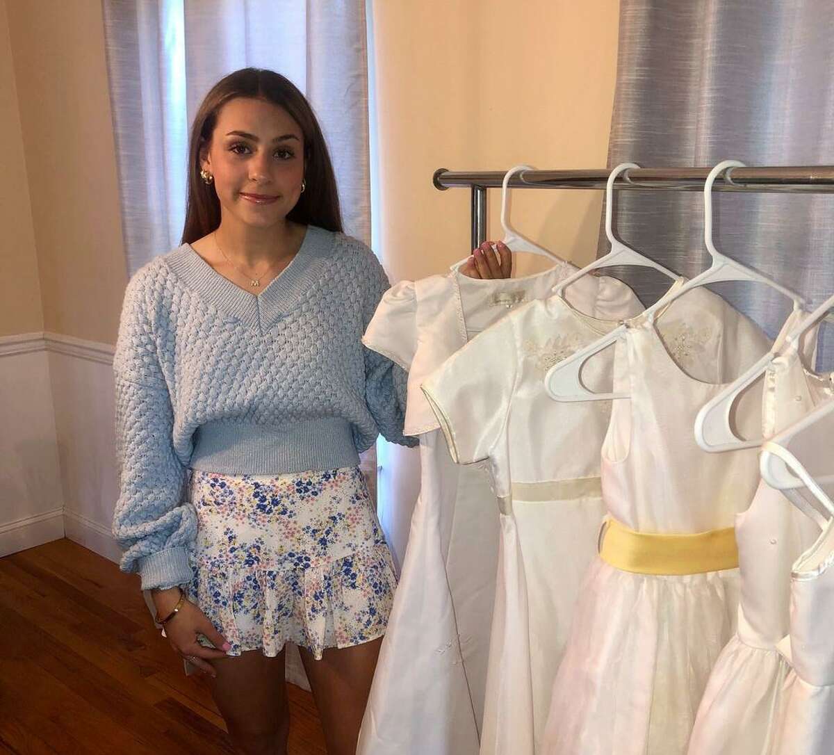 Mallory Doyle, a junior at St. Joseph High School and a Shelton resident, is continuing a Communion Closet started by her sister several years ago for the upcoming Communion season.