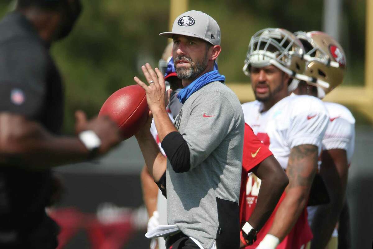 49ers head coach Kyle Shanahan throws the football during San Francisco 49ers 2020 Training Camp practice at SAP Performance Facility at Levi's Stadium on Monday, August 17, 2020 in Santa Clara, Calif.