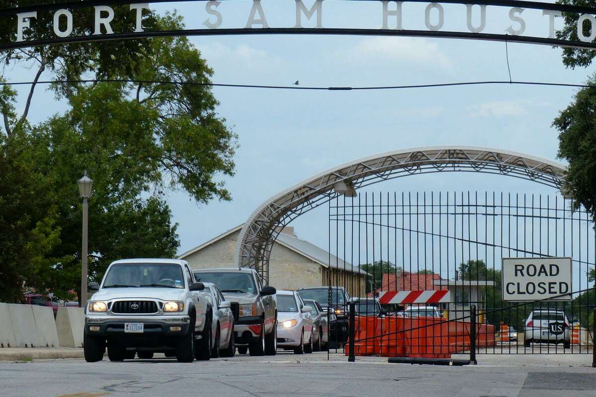 Traffic exits Fort Sam Houston at the New Braunfels Avenue gate at Grayson Street.