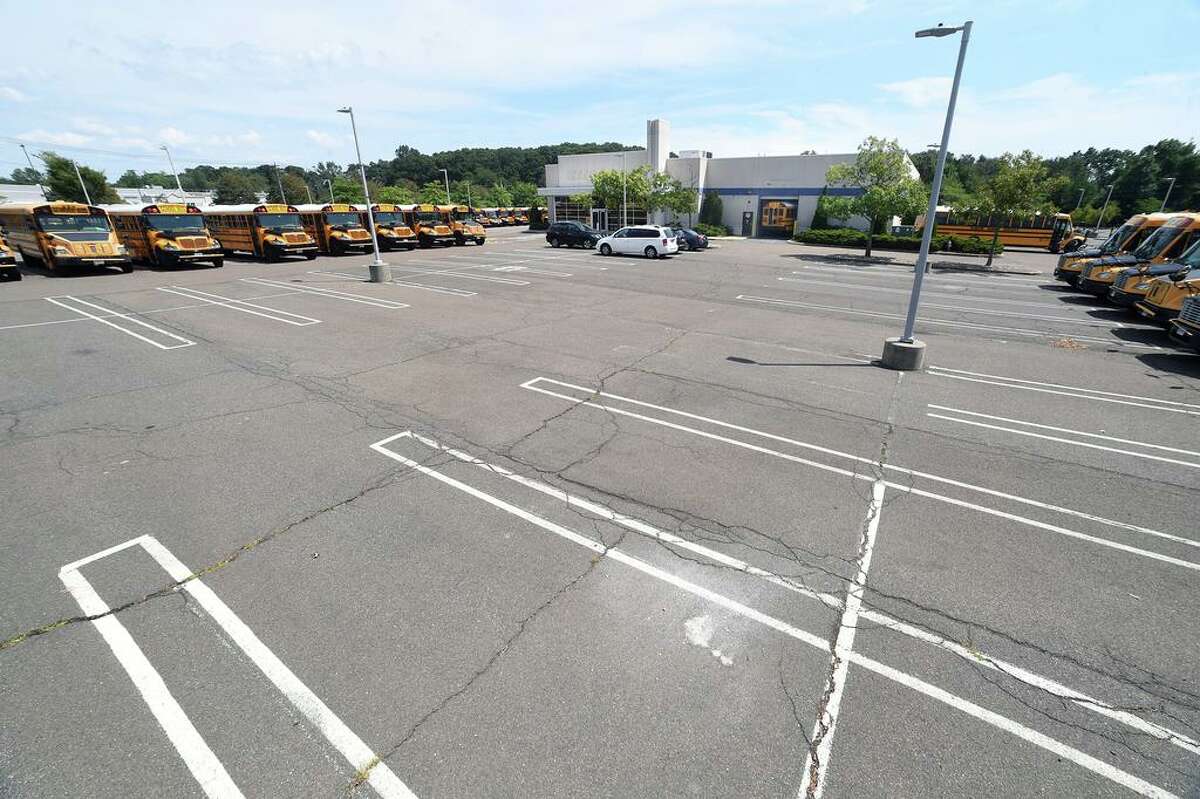 The parking lot outside of the former Sears Auto Center at the Connecticut Post Mall in Milford photographed on August 14, 2020 where a luxury apartment complex has been proposed.