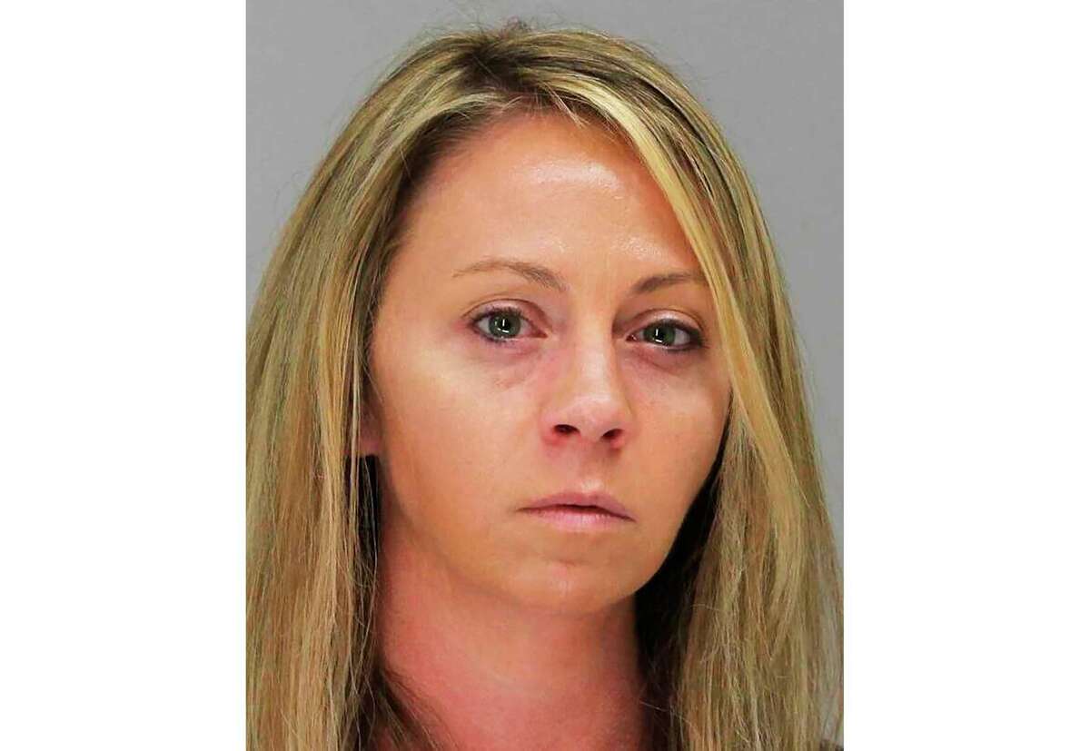 FILE - This October 2019 file booking photo provided by the Dallas County Sheriff's Department shows former Dallas Police Officer Amber Guyger. A Texas court is scheduled to hear arguments Tuesday, April 27, 2021, on overturning the conviction of Guyger, who was sentenced to prison for fatally shooting her neighbor in his home. An attorney for Guyger and prosecutors are set to clash before an appeals court over whether the evidence was sufficient to prove that her 2018 shooting of Botham Jean was murder. (Dallas County Sheriff's Department via AP, File)