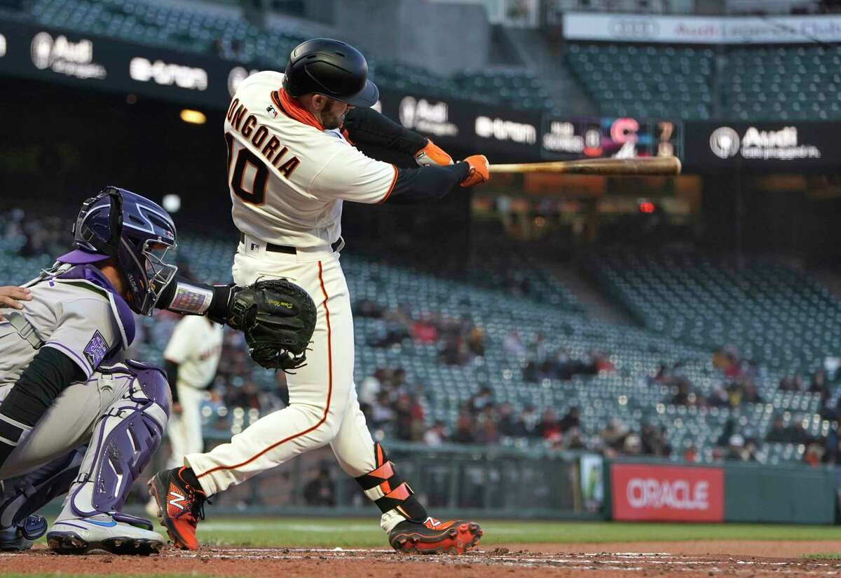 SAN FRANCISCO, CALIFORNIA - APRIL 26: Evan Longoria #10 of the San Francisco Giants hits a two-run double against the Colorado Rockies in the second inning at Oracle Park on April 26, 2021 in San Francisco, California. (Photo by Thearon W. Henderson/Getty Images)