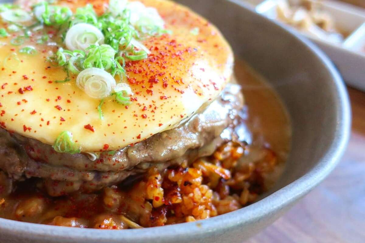 The loco moco with kimchi fried rice served at Namu Gaji. The Korean restaurant, owned by chef Dennis Lee and brothers David and Daniel Lee, has closed. 