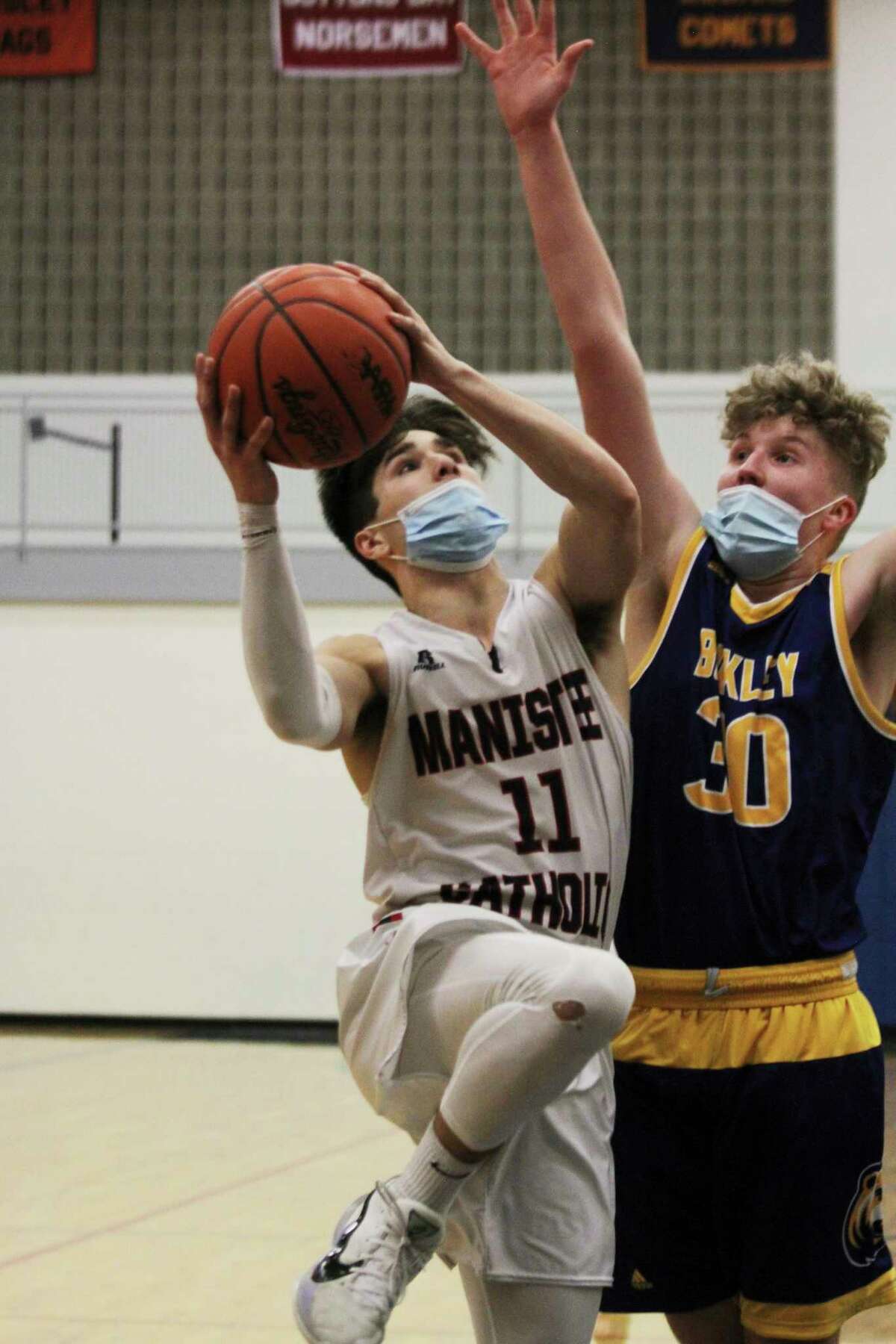 Manistee Catholic Central senior Mateo Barnett was named an All-State honorable mention in Division 4 boys basketball. (News Advocate file photo)