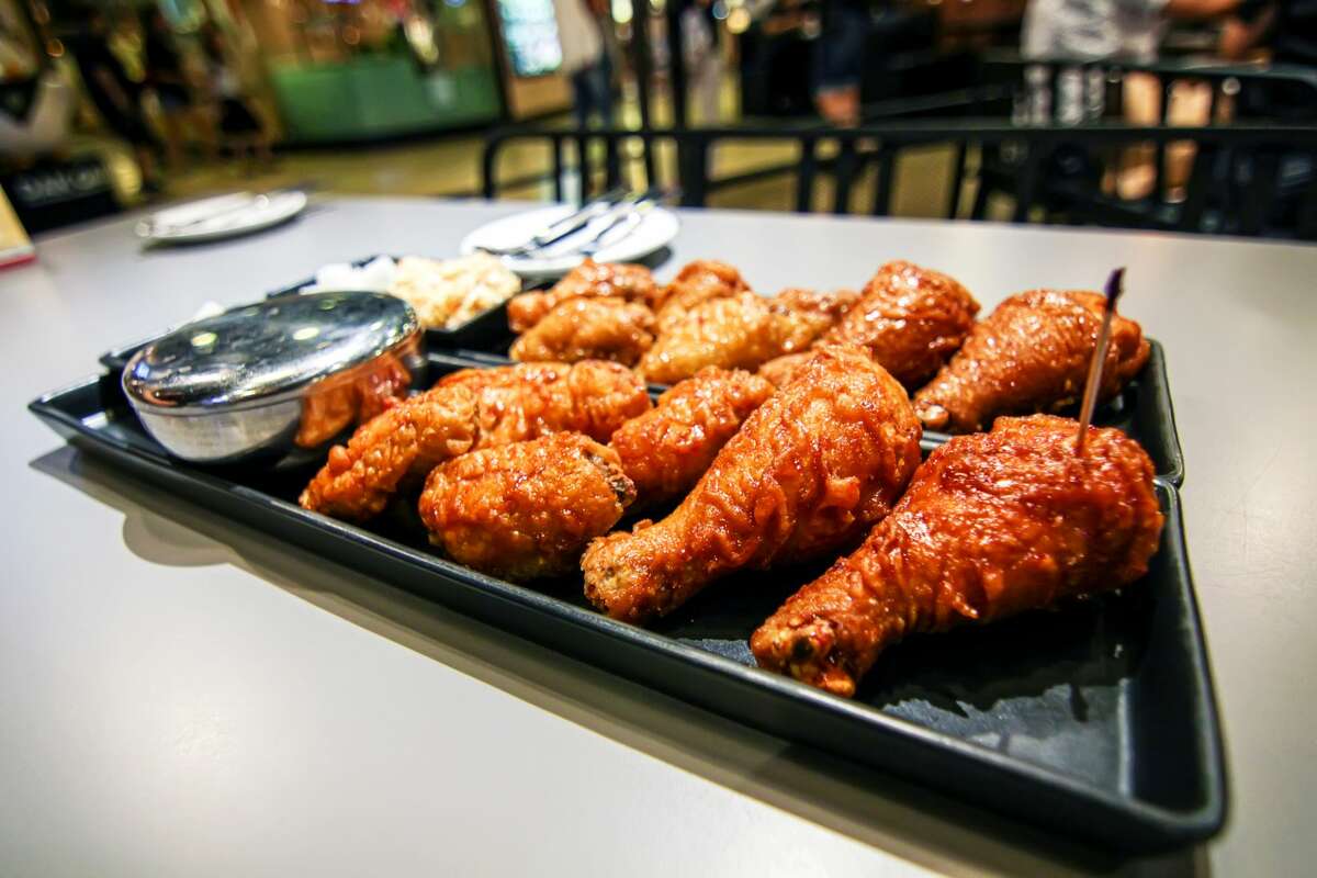 A plate of Bonchon's damn-good spicy fried chicken.