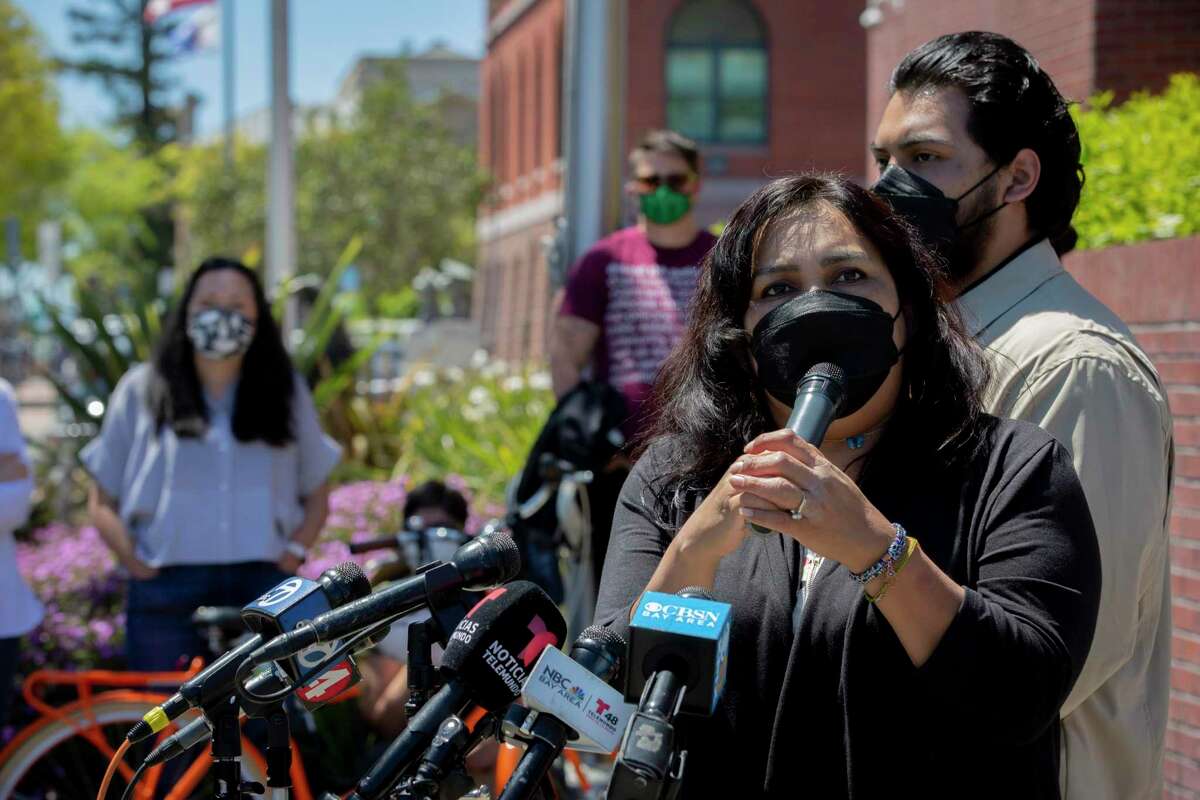 The mother of Mario Gonzalez, Edith Arenales, makes a statement at a news conference outside the Alameda Police Department on Tuesday.
