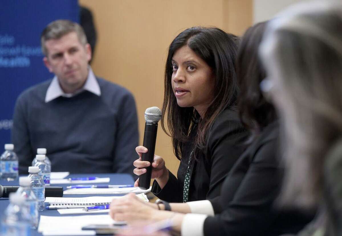 Milford Director of Health Deepa Joseph (center) speaks at a roundtable discussion on the impact of the coronavirus at Bridgeport Hospital's Milford Campus on February 28, 2020.