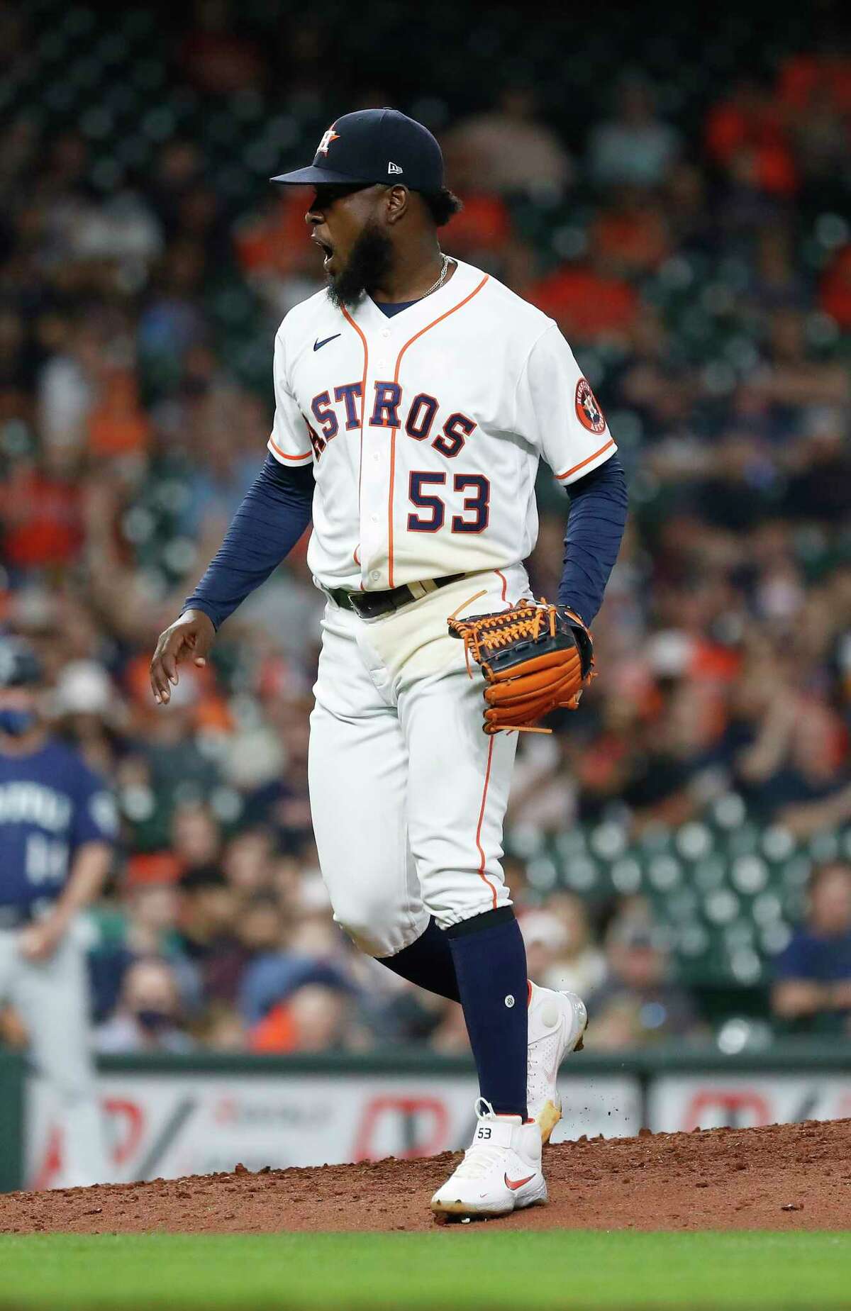 Houston Astros starting pitcher Cristian Javier (53) reacts after striking out Seattle Mariners Sam Haggerty to end the seventh inning of an MLB baseball game at Minute Maid Park, Tuesday, April 27, 2021, in Houston.