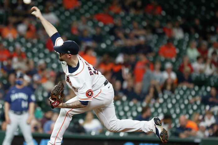 Seattle Mariners starting pitcher Yusei Kikuchi begins his windup