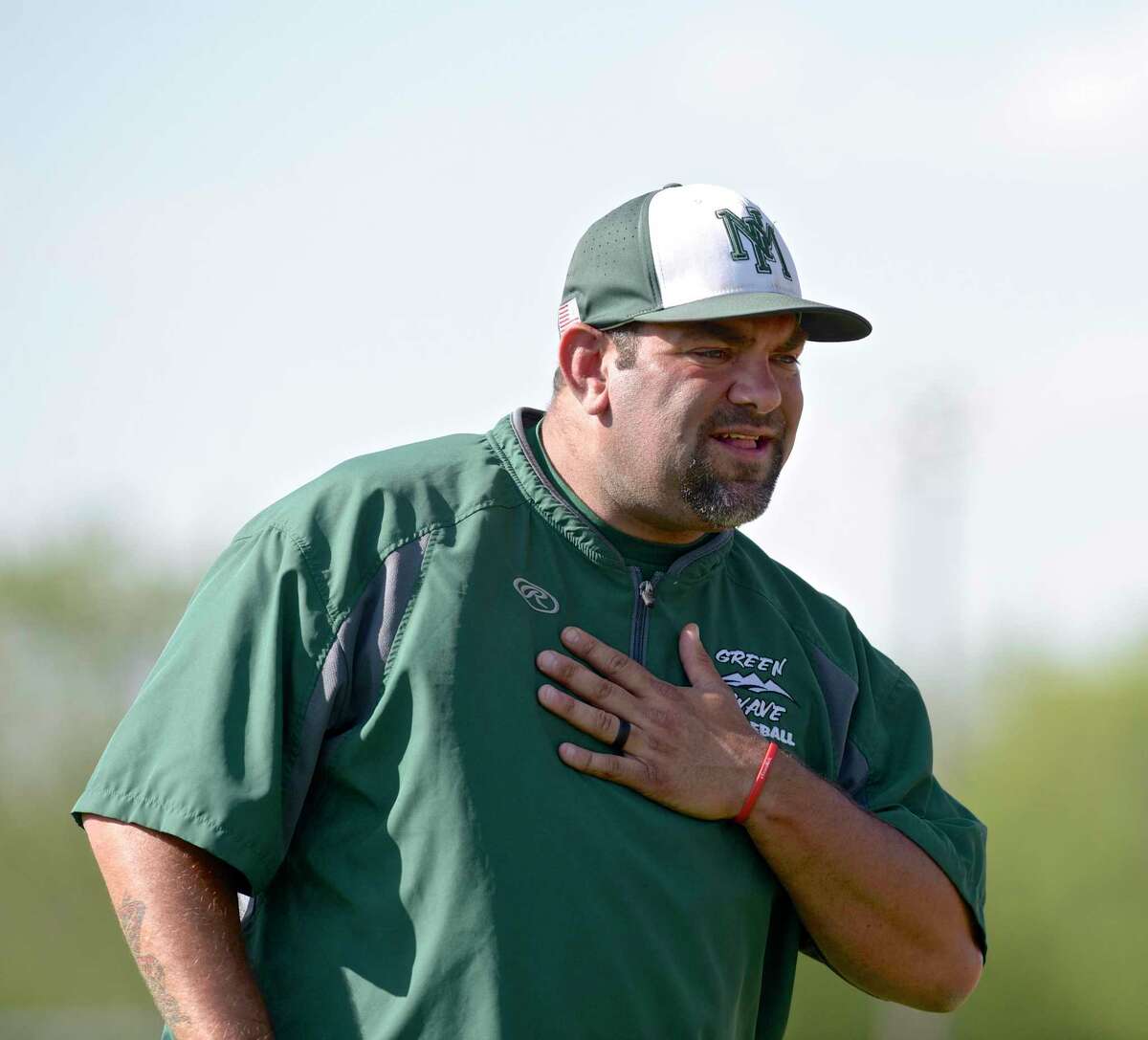 New Milford head coach Ryan Johnson .