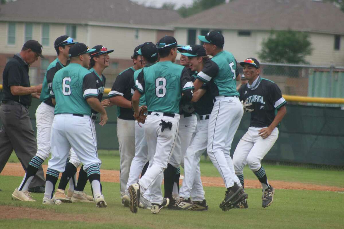 Pasadena Memorial players celebrate the final out to Tuesday's game that saw the team win its 11th straight district game, earning a share of the 22-6A crown.