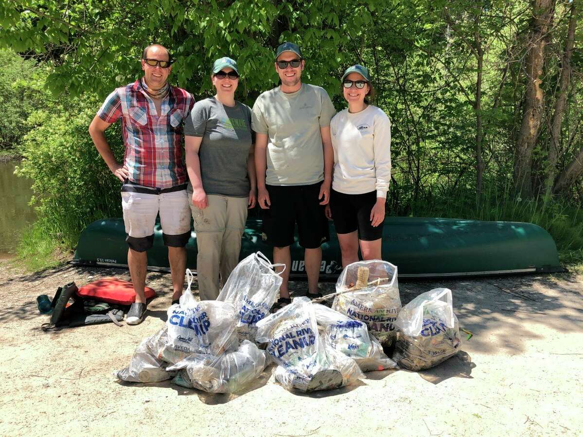 Volunteers with the Benzie Conservation District regularly take hundreds of pounds of trash out of the Betsie and Platte rivers during clean-up days. (Courtesy Photo)