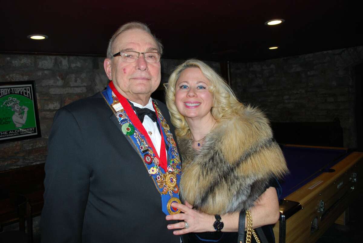 Joel Spiro and his wife, Kira, at an event for the Chaine des Rotisseurs, a French dining society for which Spiro co-founded the local chapter. (Photo courtesy Bill Harris.)