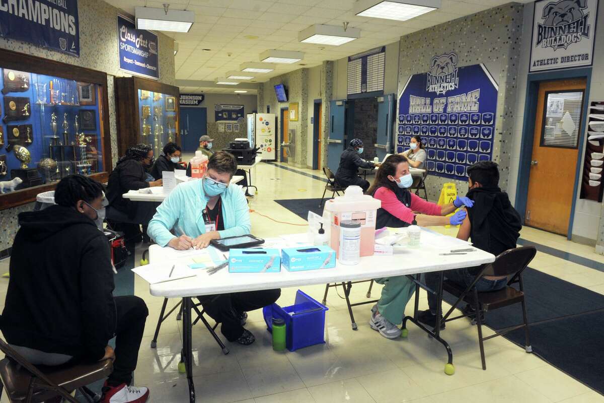 A file photo of a clinic for COVID-19 vaccines offered to students at Bunnell High School in Stratford, Conn. April 28, 2021.