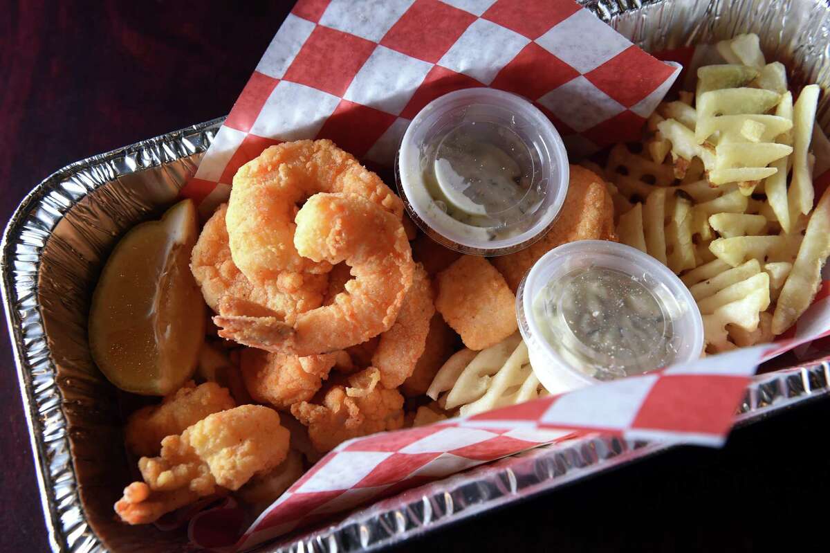 An order of fried shrimp and fries pictured at Still Off The Hookon Whalley Avenue in New Haven on April 28, 2021.
