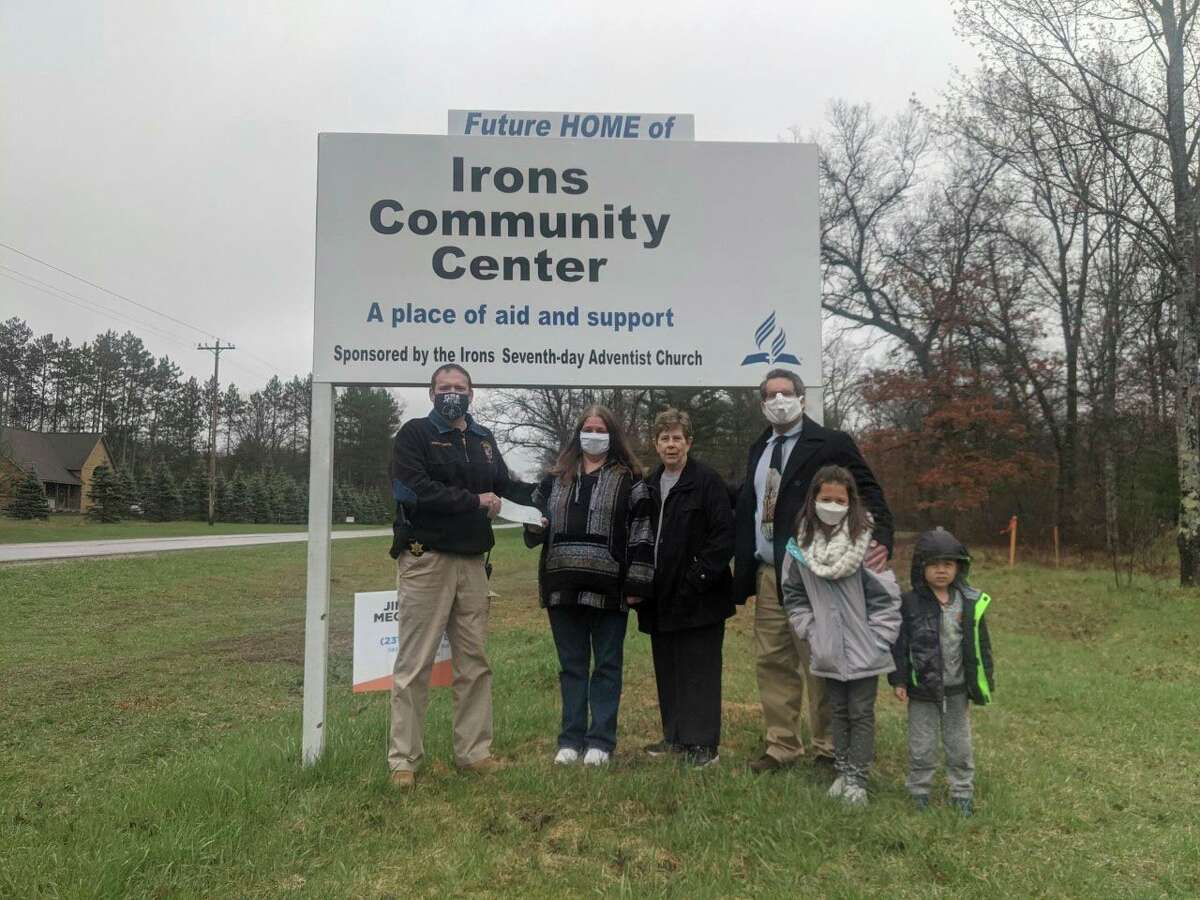 Sheriff Rich Martin presented the Irons Area Community Center staff with a donation from the Sheriff's Returnables Charity Campaign, an ongoing program to help support local Lake County charities. (Submitted photo)