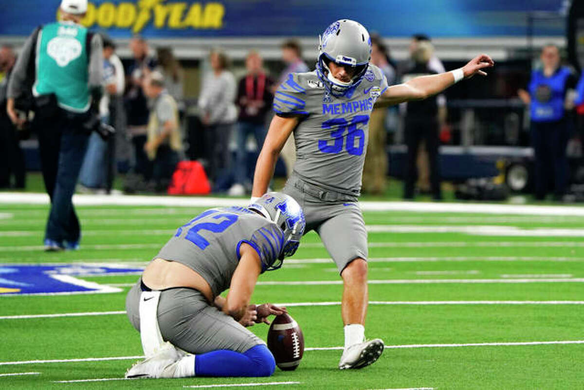 Memphis place kicker Riley Patterson (36) practices kicking field goals during warmups before an NCAA Cotton Bowl college football game against Penn State, Saturday, Dec. 28, 2019, in Arlington, Texas.