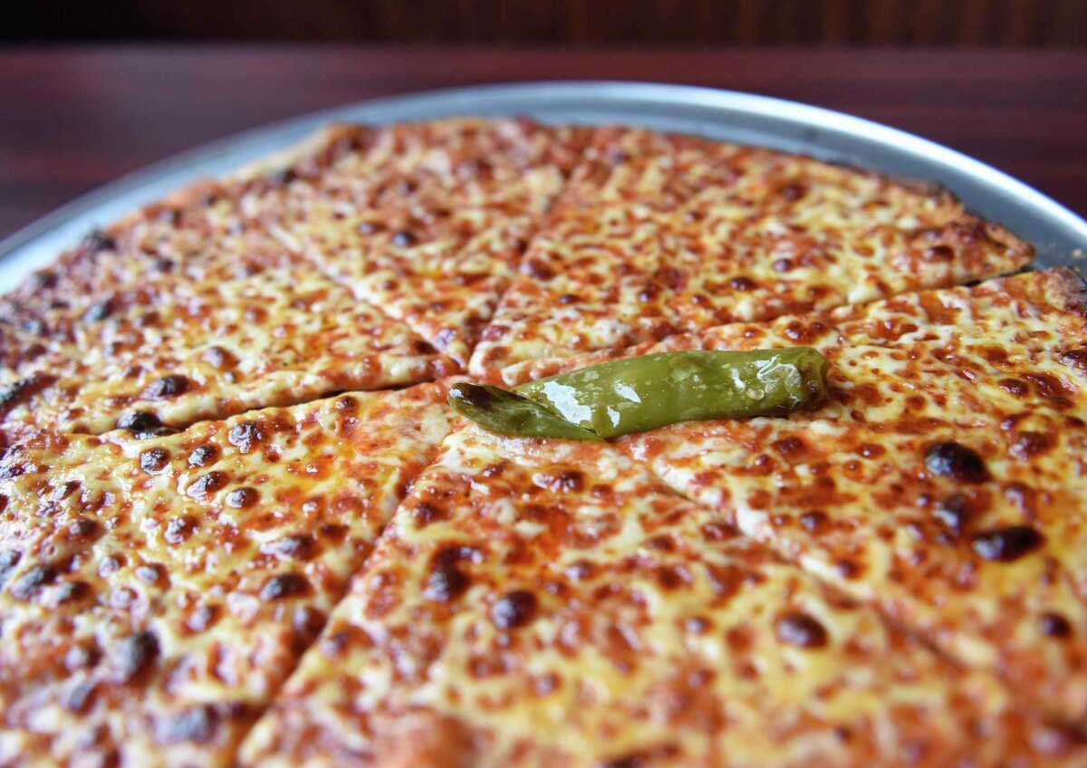 A popular hot oil pizza is served at Colony Grill.