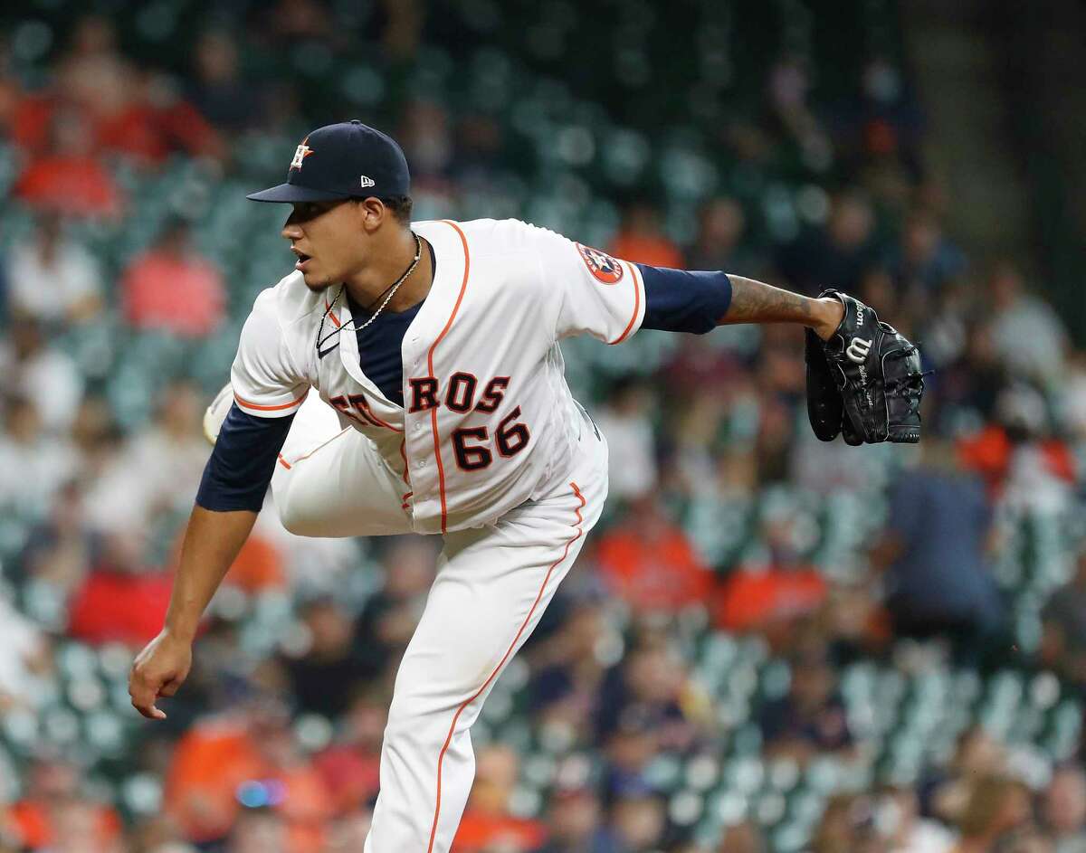 Houston Astros relief pitcher Bryan Abreu stands for the singing of News  Photo - Getty Images