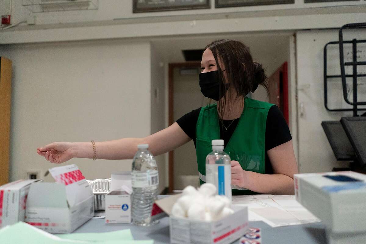 MedSci student, Kaili Collins, volunteer at the vaccination site at Vacaville High School in Vacaville, California.