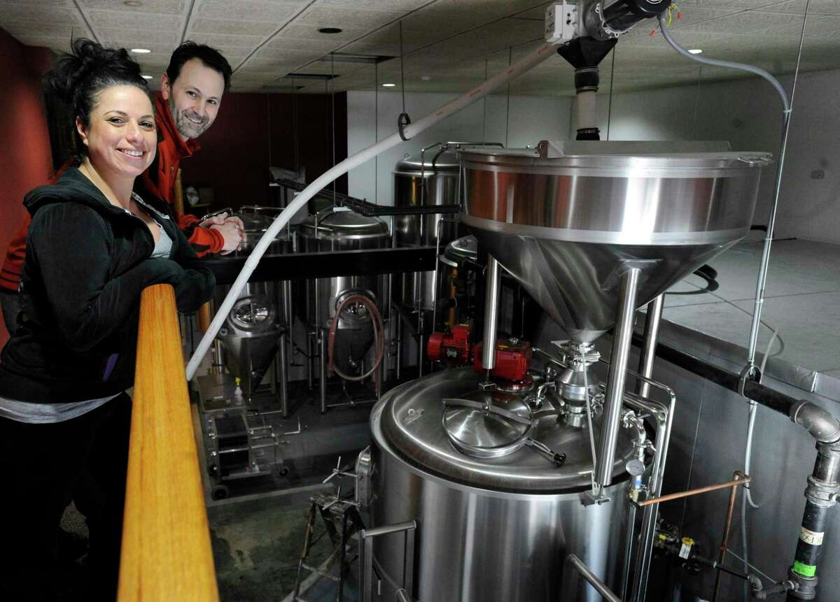 File photo. Rick Cipriani and Wendy Wulkanare seen here in 2014 as co-owners of the former Bull and Barrel Brewery and Restaurant in Brewster, N.Y., which closed in December. Cipriani has proposed a new brewery in Danbury.