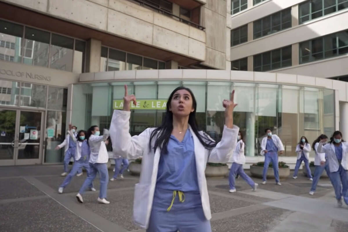 A screen capture from UCSF School of Medicine's parody video of "WAP, "Tik Tok" and "Formation."