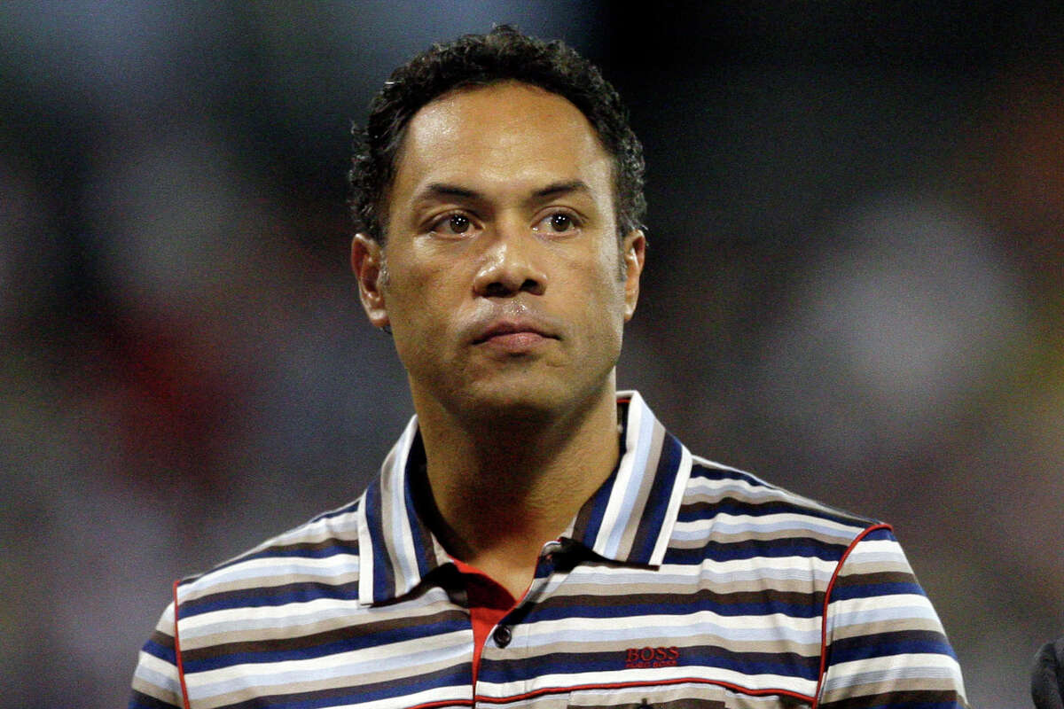 FILE - In this June 30, 2010, file photo, former Major League Baseball player Roberto Alomar looks on before the start of a baseball game between the New York Mets and the Florida Marlins in San Juan, Puerto Rico. the Hall of Fame second baseman has been fired as a consultant by Major League Baseball and placed on the league's ineligible list following an investigation into an allegation of sexual misconduct, Commissioner Rob Manfred announced Friday, April 30, 2021.