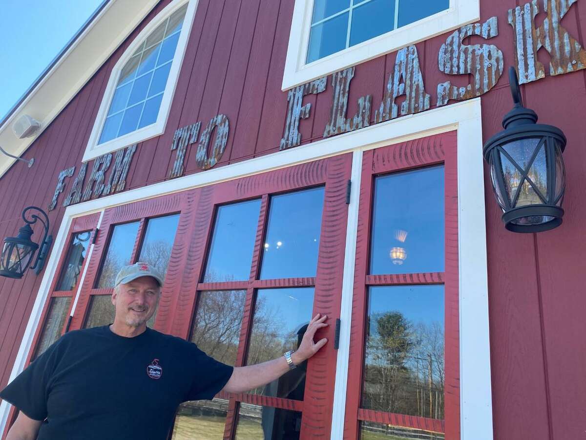Dan Beardsley in front of his new business, White Hills Distillery, located on his father's farm off Leavenworth Road. The distillery is to open in early June 2021.