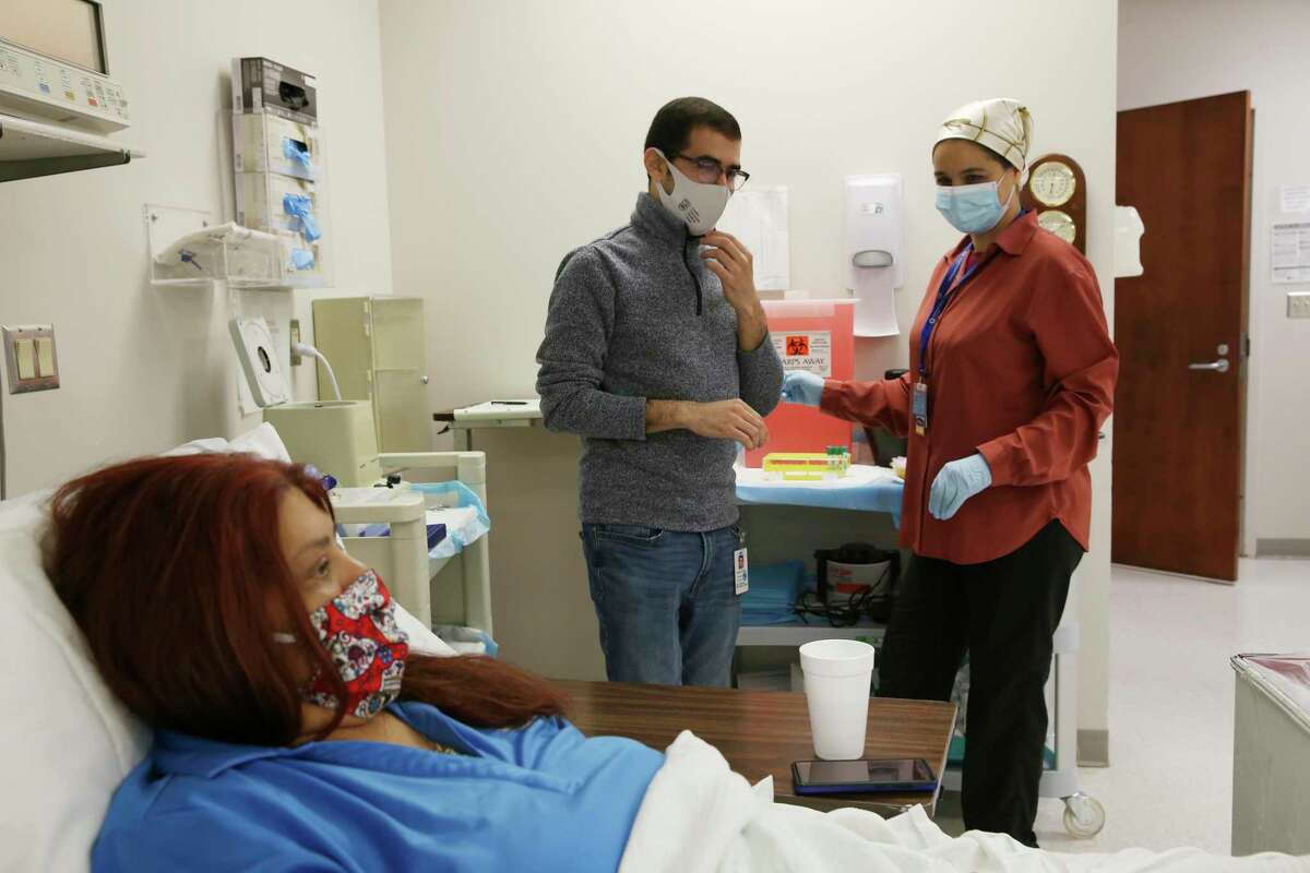 Melissa Mata, 55, undergoes blood glucose testing at the Texas Diabetes Institute on April 30, 2021. During a laparoscopic procedure in late March, fat from around her intestines was dissolved and removed as part of a study aimed at reversing the effects of Type 2 diabetes through surgery.