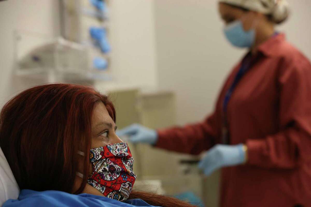 Melissa Mata, 55, undergoes blood glucose testing at the Texas Diabetes Institute on April 30, 2021. Before undergoing an experimental surgery in March, Mata had trouble controlling her blood sugar levels, even with medications, diet and exercise.