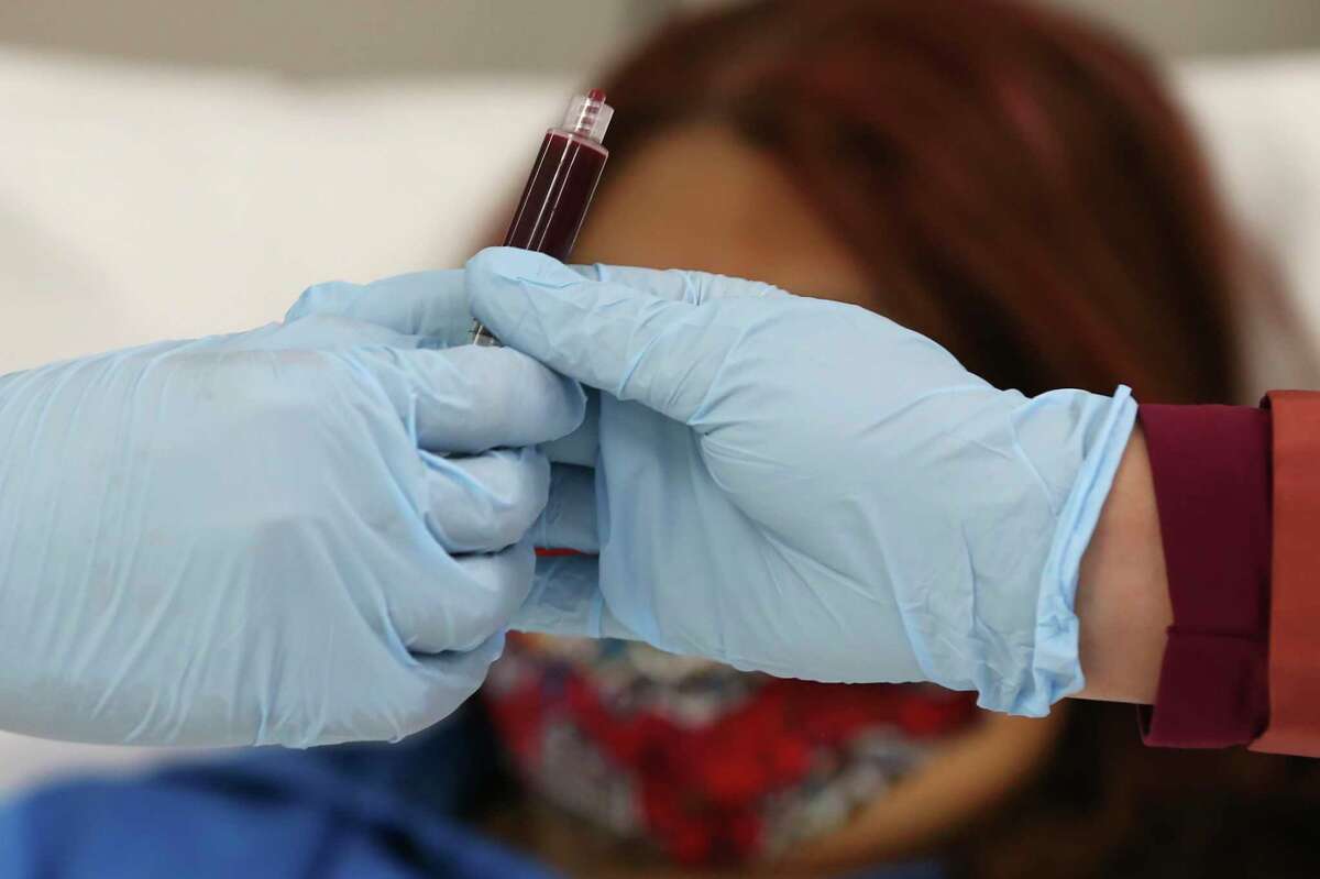 Melissa Mata, 55, goes through a series of blood glucose tests at the Texas Diabetes Institute. On March 31, Mata underwent a procedure that removed internal fat from around her intestines, in the hopes of staying off insulin for her Type 2 diabetes.